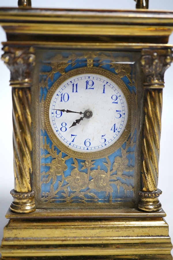 A miniature carriage timepiece, with four ornate corner columns, turquoise dial and gilt filigree mount, 8cm high. Condition - fair, not tested as working